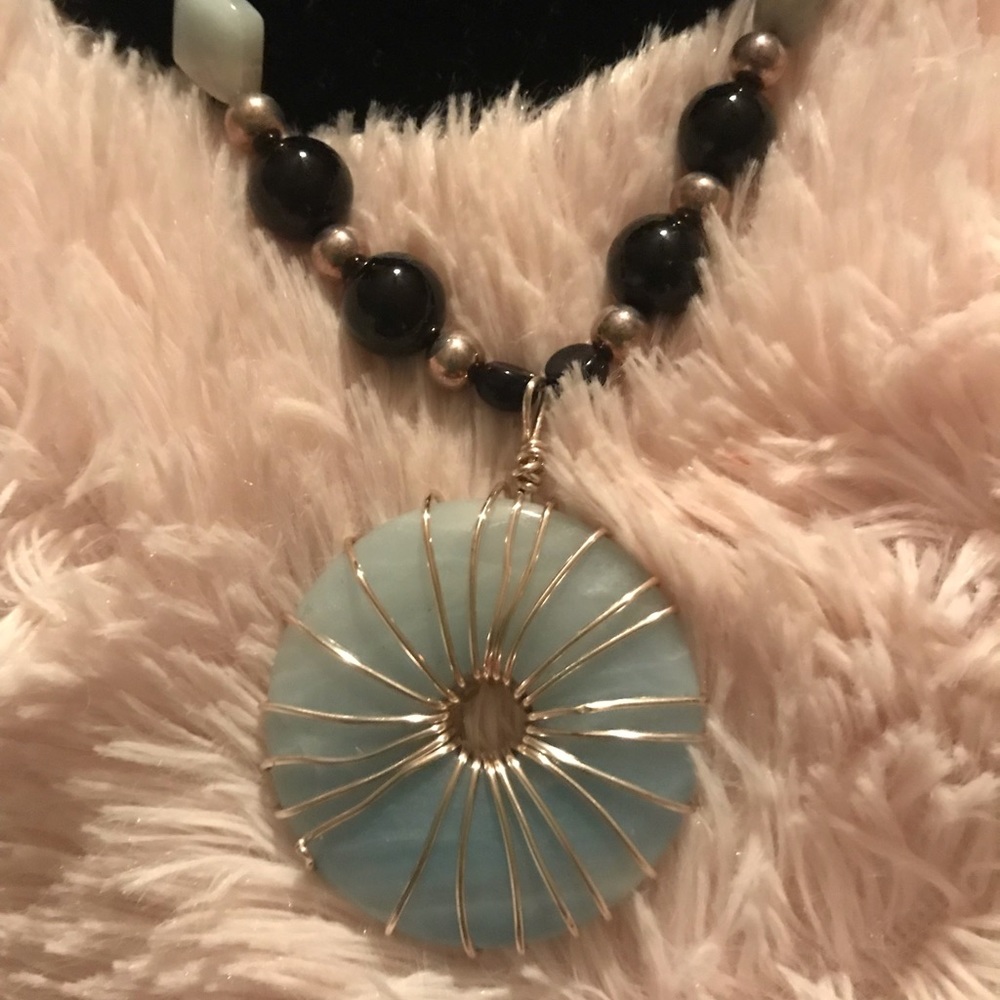 Stone necklace with assortment of beads and stone